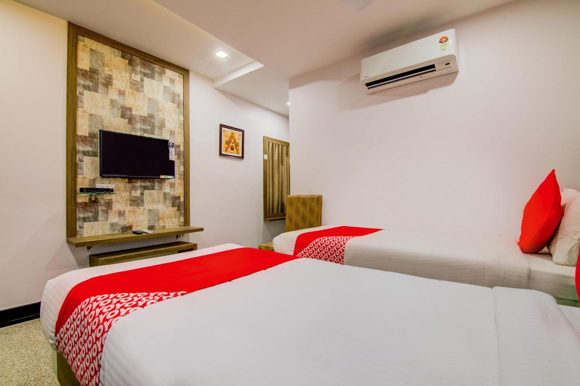 Capital O Pratibha Grand Hotel